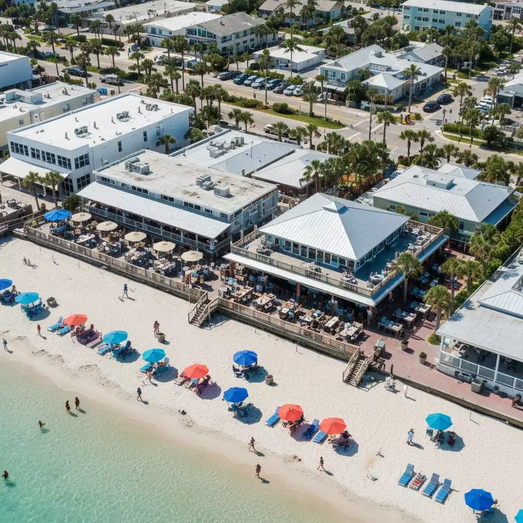 Aerial view of Fort Myers Beach with various restaurants and outdoor seating areas