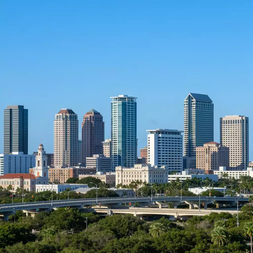 Modern Fort Myers city skyline with new developments against a clear sky, representing growth and opportunity